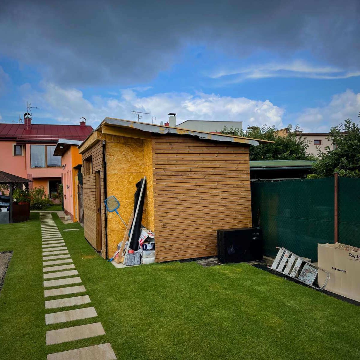 Garden house in a modern garden from Dream Garden - a functional and designer space for storing tools