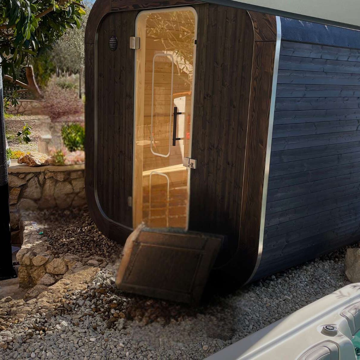 Installing an outdoor sauna in the garden from Dream Garden - professional installation of a sauna house