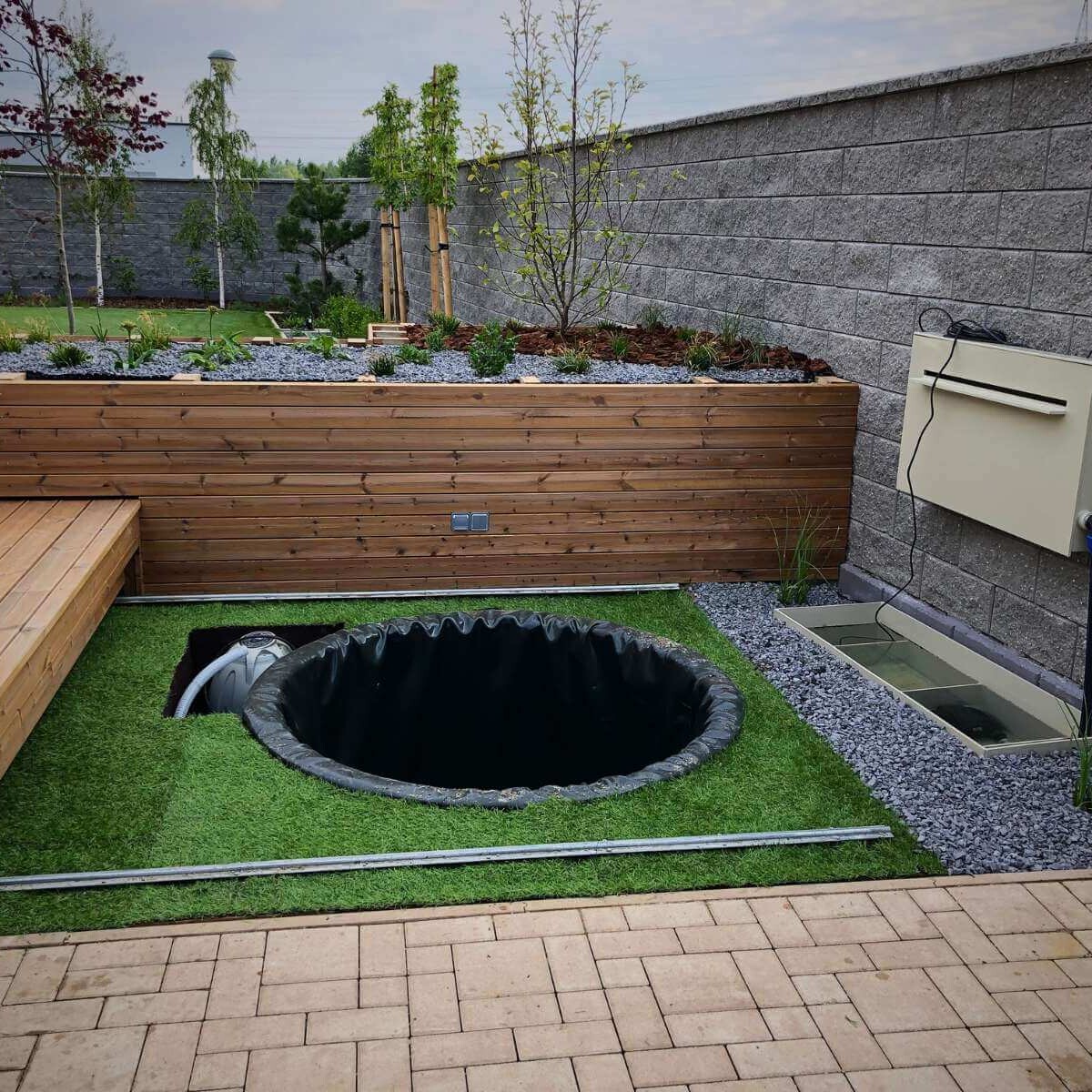 Implementation of a rainwater retention tank from Dream Garden - professional installation of an ecological storage tank for capturing and efficiently using rainwater