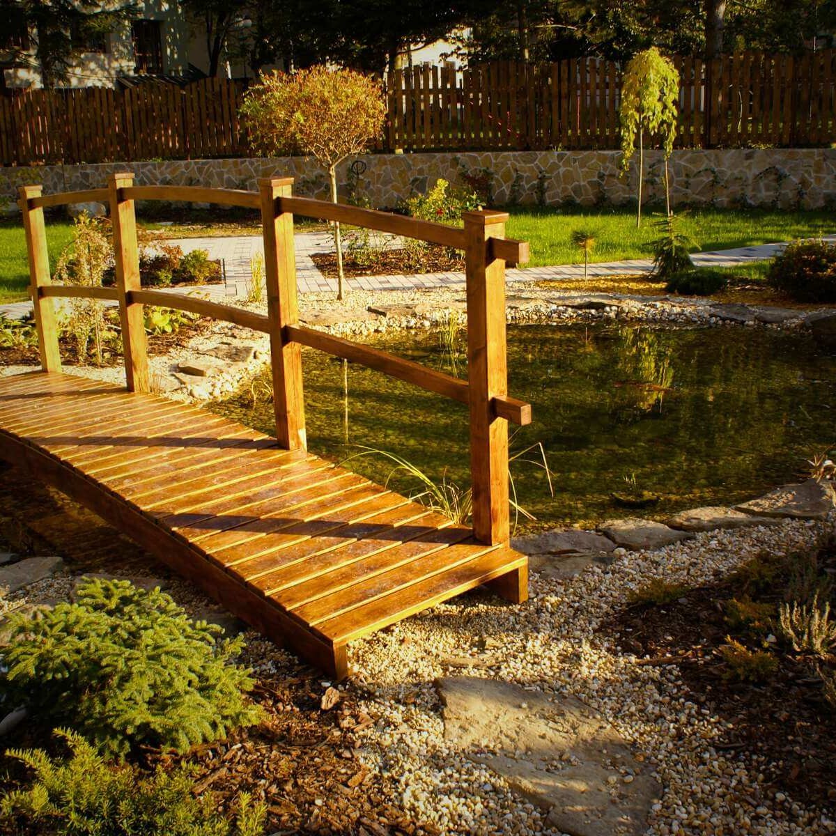 Wooden bridge over a garden pond from Dream Garden