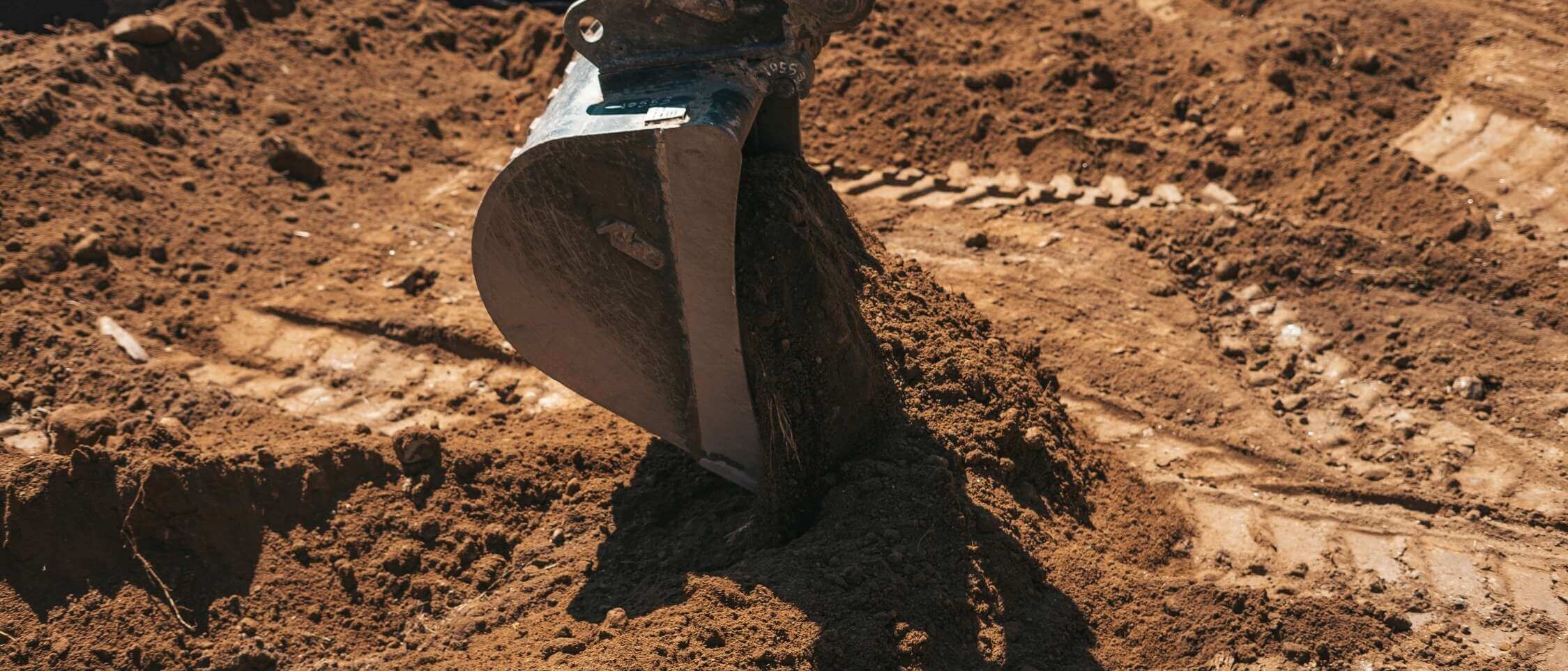 Excavation work in preparation of the exterior or garden using construction equipment - Terrain and construction modifications