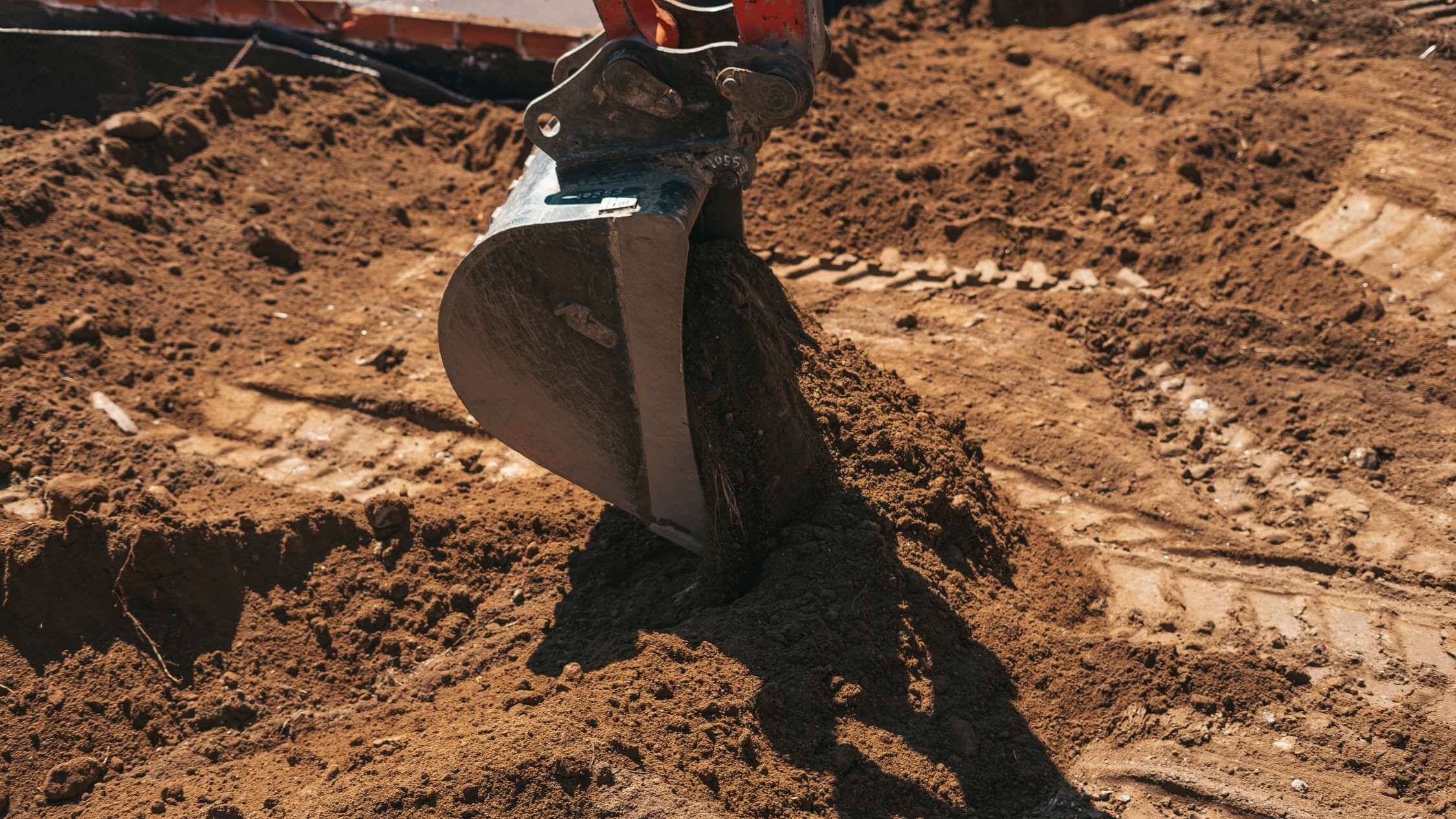 Excavation work in preparation of the exterior or garden using construction equipment - Terrain and construction modifications