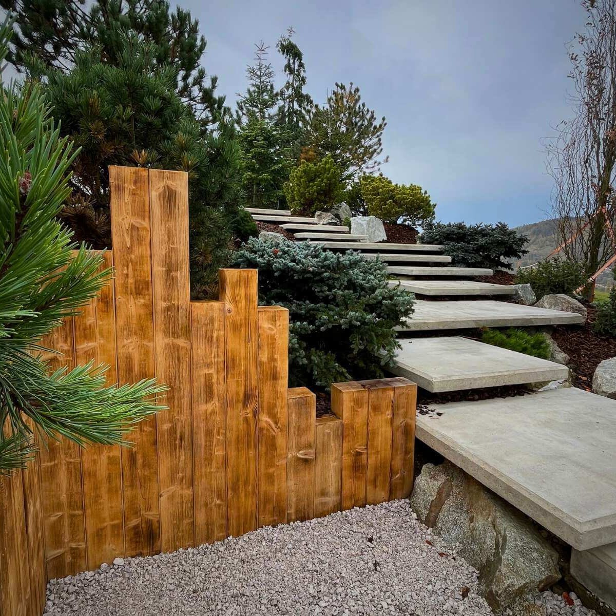 Flying stairs made of Schellevis concrete slabs in a modern garden from Dream Garden - custom garden design.