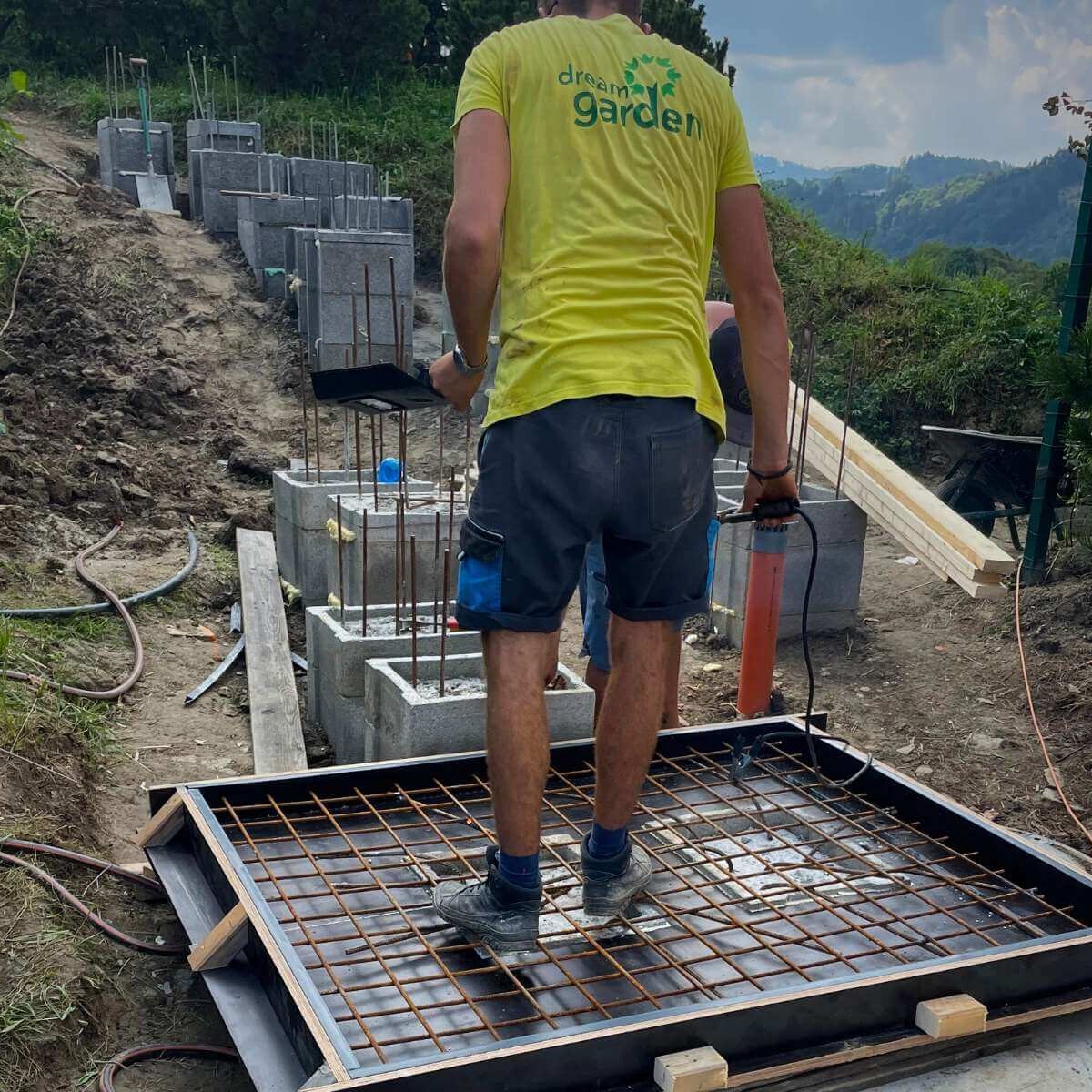 Preparing the ground for laying concrete slabs in the garden from Dream Garden
