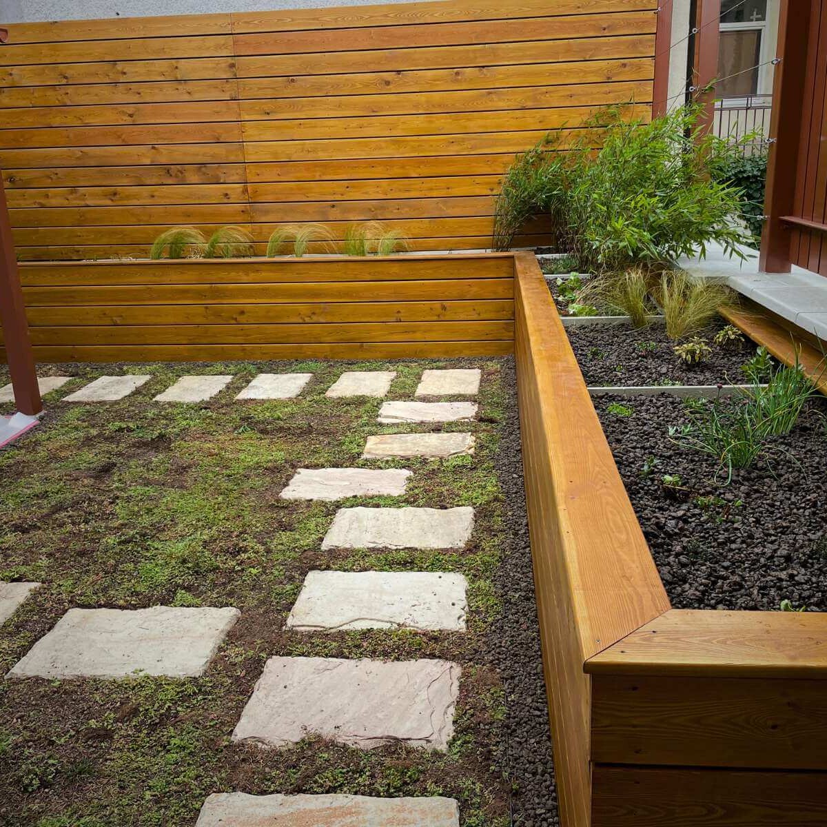 Raised beds with ornamental planting on an outdoor terrace from Dream Garden